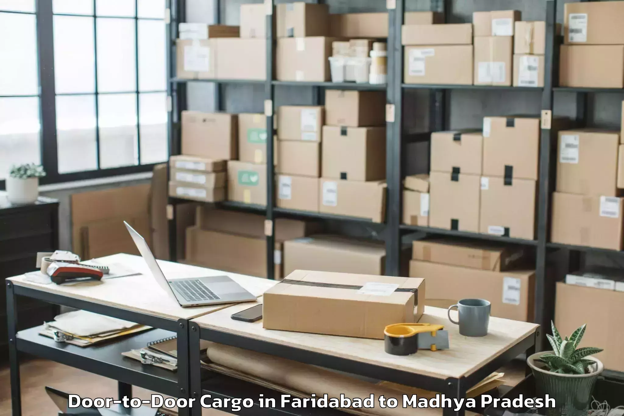 Book Faridabad to Satna Door To Door Cargo Online